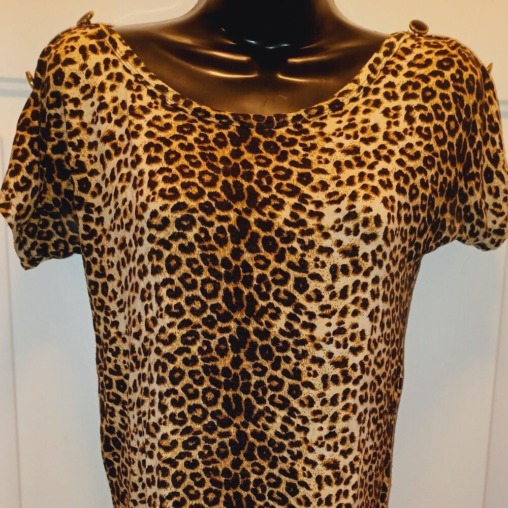 Leopard print short sleeve blouse with ruffle shoulder detail blouse